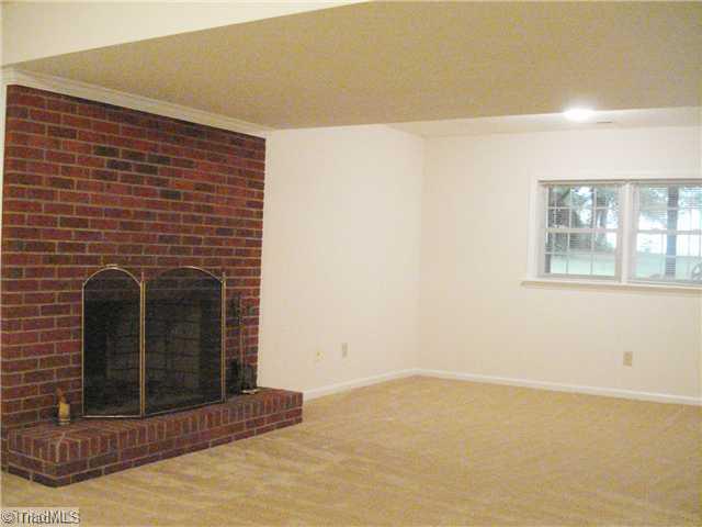 1105 Ridgecliff Drive Rural Hall, NC 27045 - Photo 12 of 14 Den/Family/Great Room. DEN W/FULL MASONRY FIREPLACE