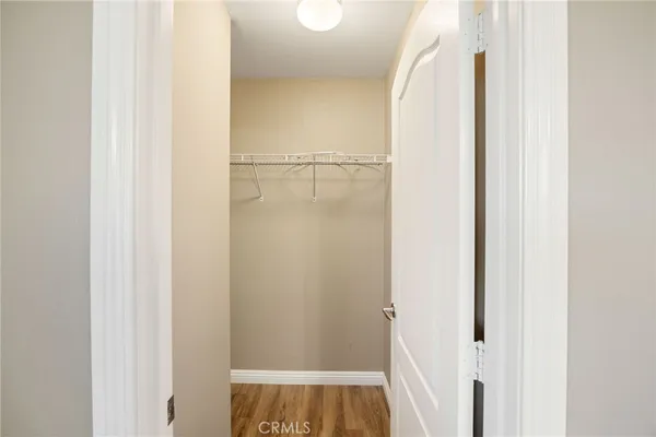 a view of a room with racks on the wall