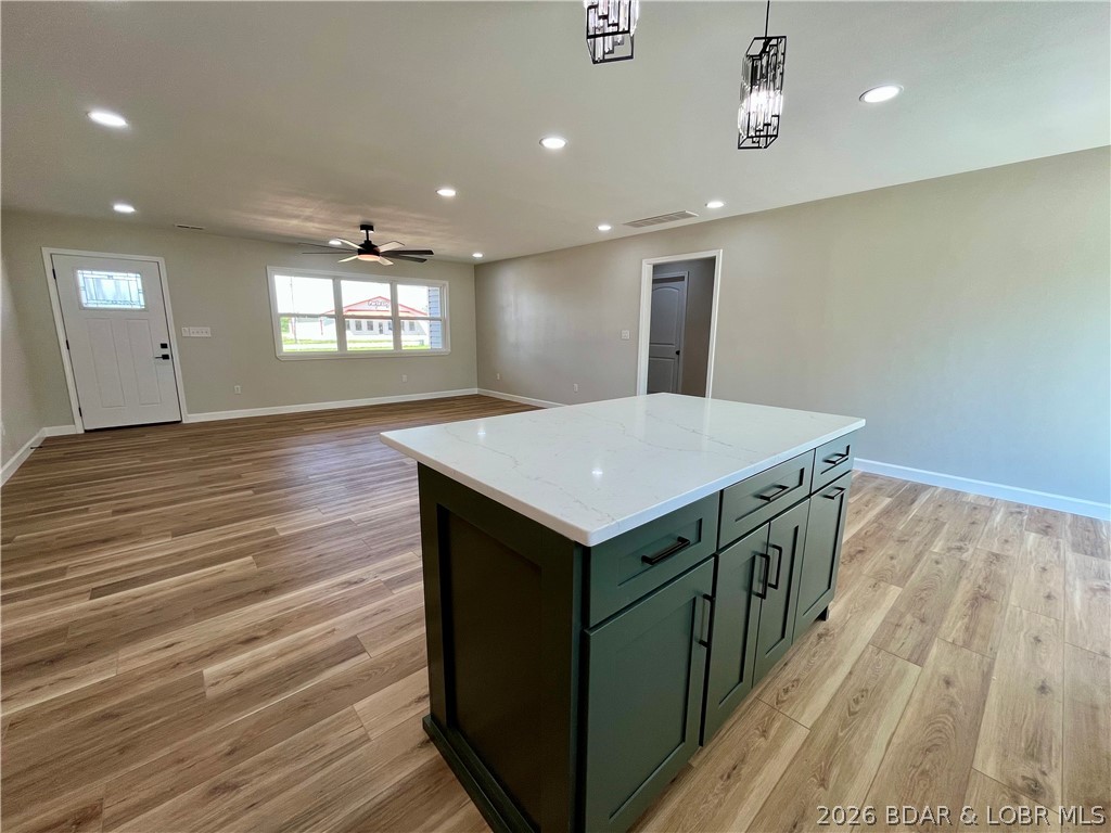 602 West 4th Street Stover, MO 65078 - Photo 4 of 33 View from island to living room