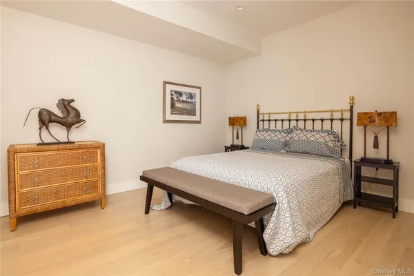 a bedroom with a bed and a cabinets