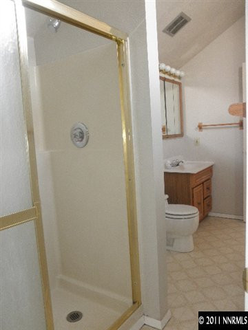 2080 Kings Row Reno, NV 89503 - Photo 8 of 11 a bathroom with a toilet a sink and shower
