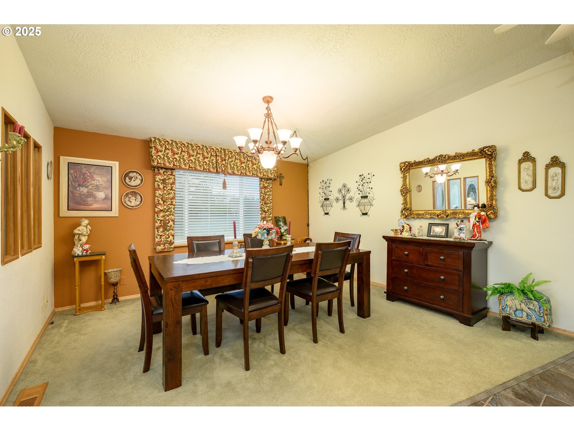 1412 Northwest Wallace Road McMinnville, OR 97128 - Photo 23 of 44 a view of a dining room with furniture and chandelier