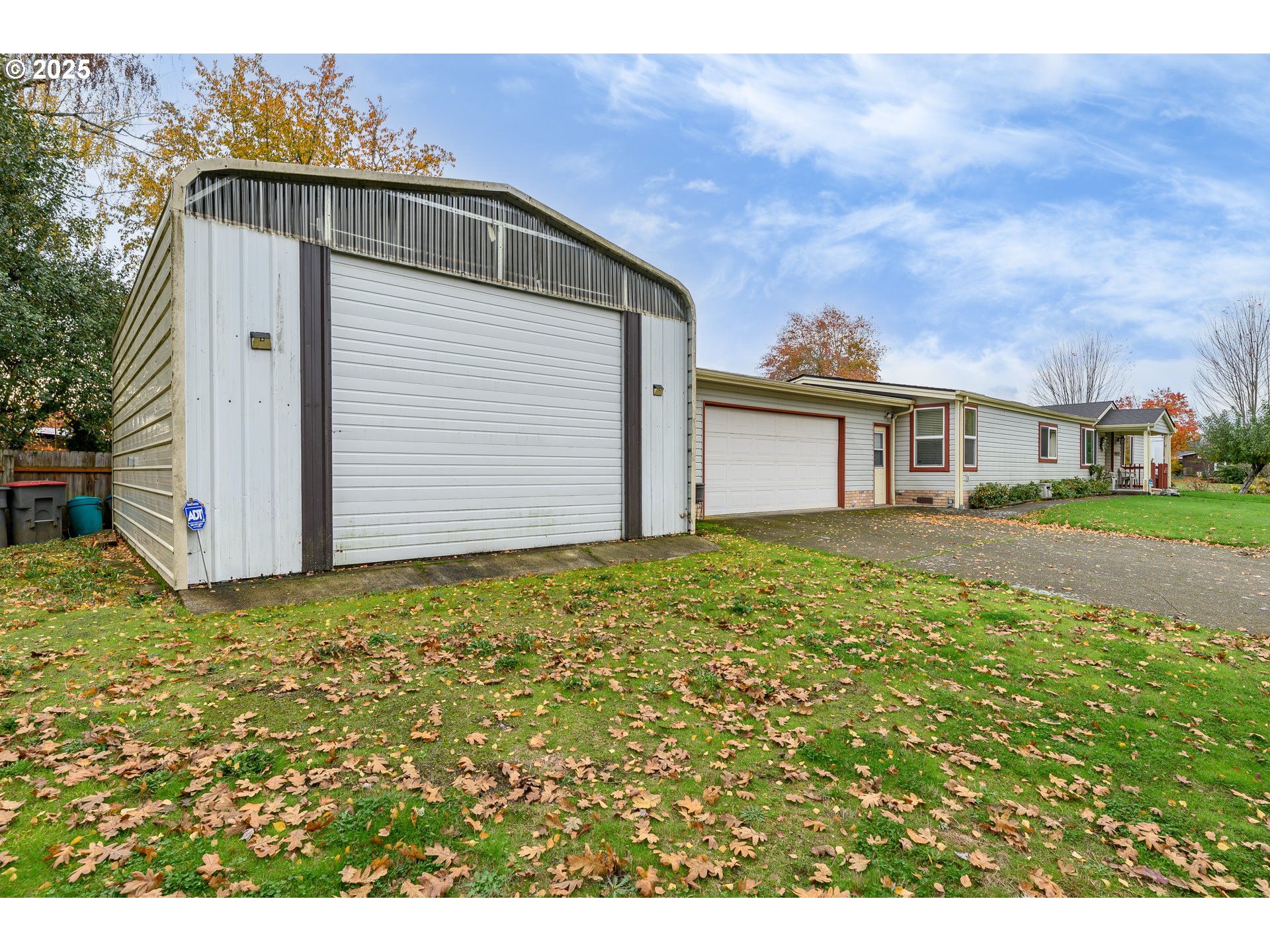 1412 Northwest Wallace Road McMinnville, OR 97128 - Photo 3 of 44 a front view of a house with a yard