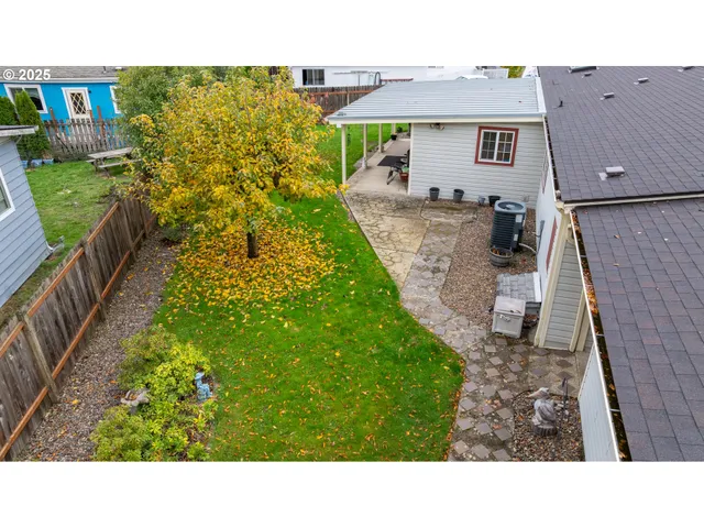 a view of a street with a building