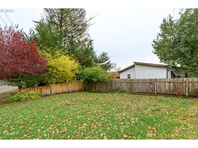 a balcony with chairs and a table