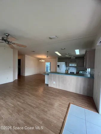a view of kitchen and kitchen island