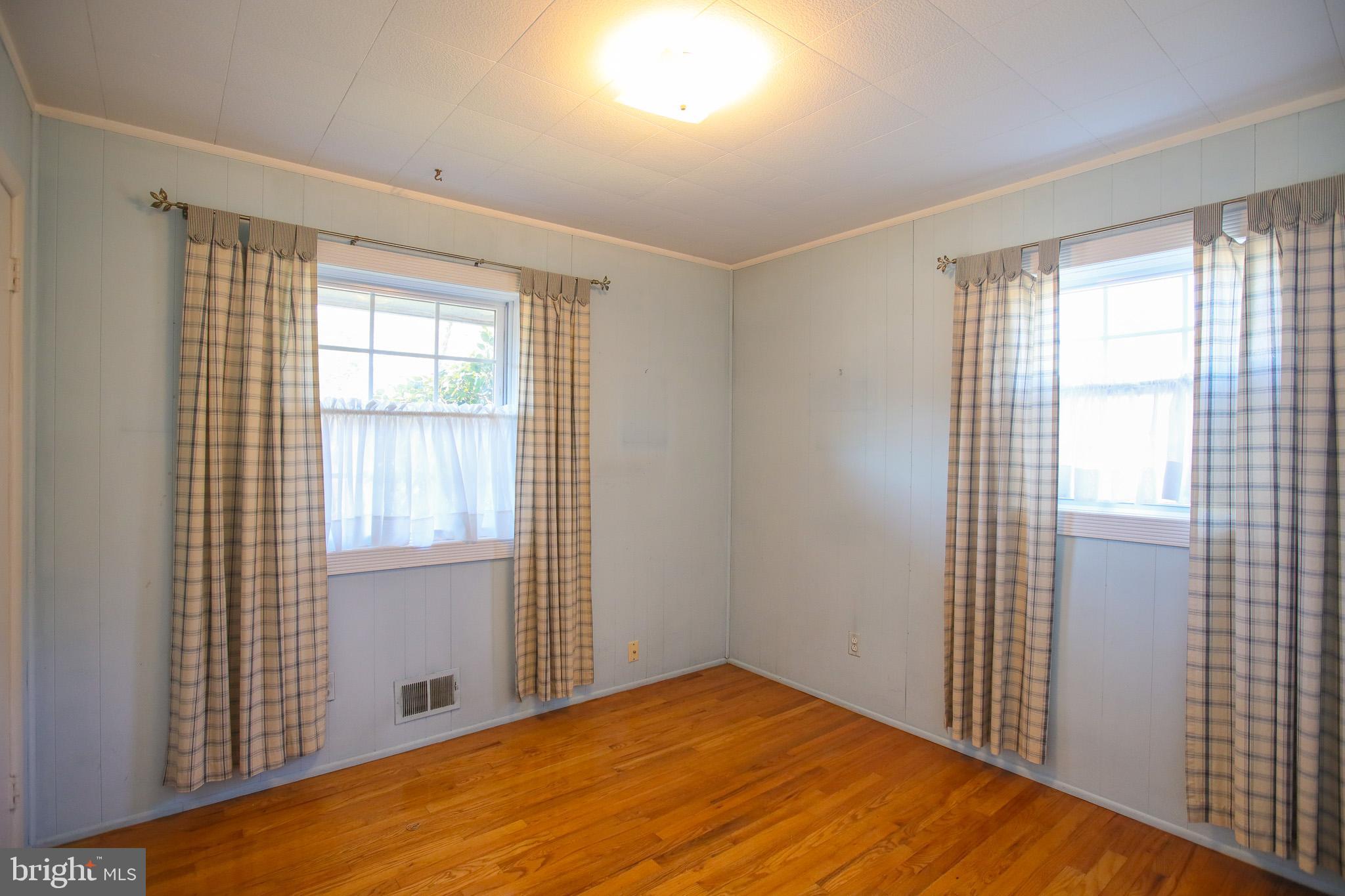 8815 Jandell Road Lorton, VA 22079 - Photo 11 of 27 a view of empty room with wooden floor