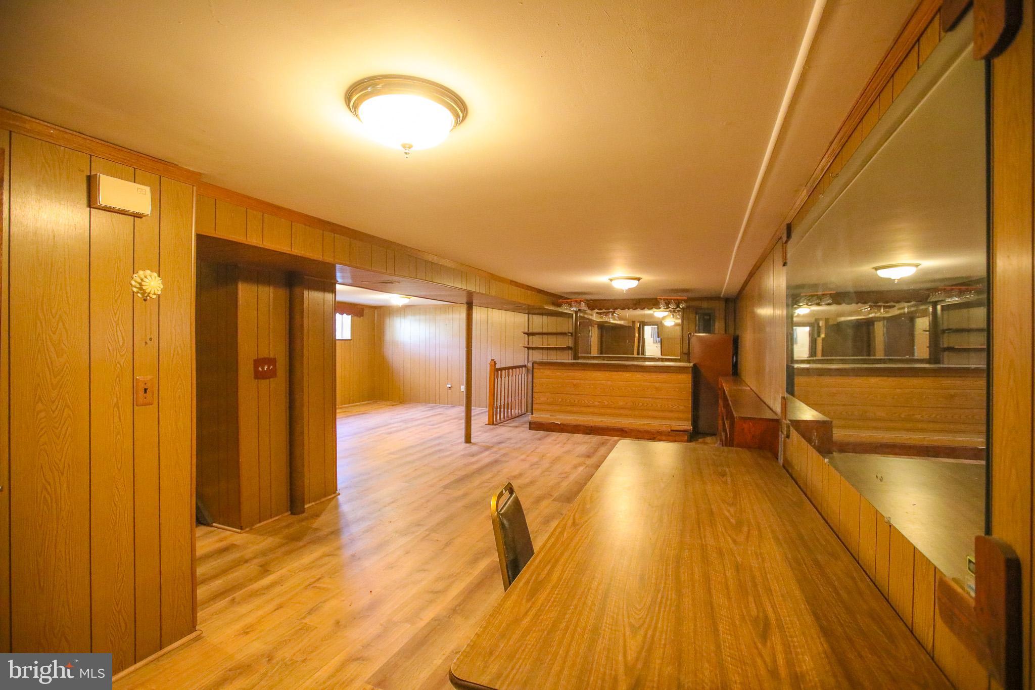 8815 Jandell Road Lorton, VA 22079 - Photo 17 of 27 a view of a room with wooden floor