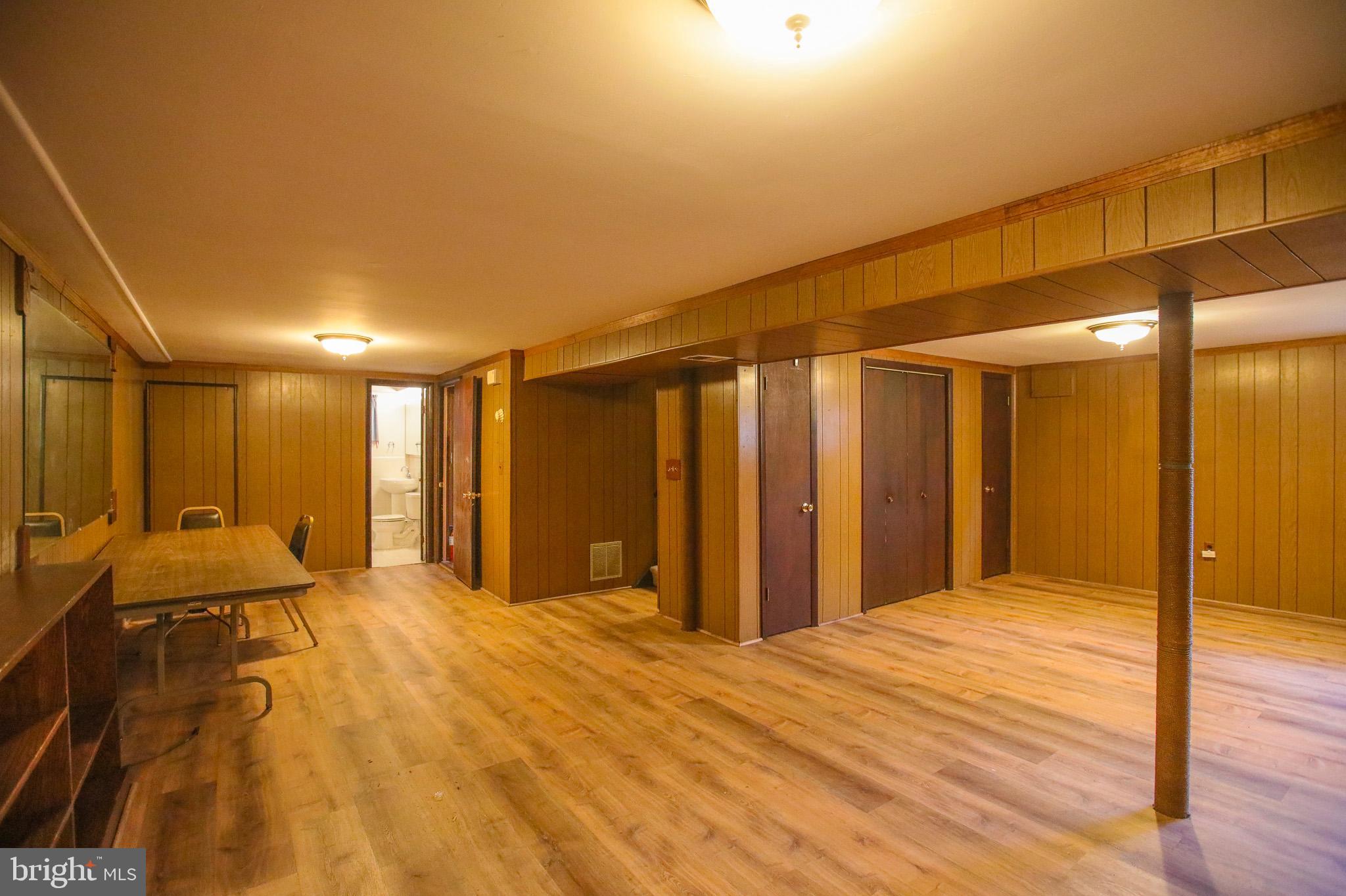 8815 Jandell Road Lorton, VA 22079 - Photo 18 of 27 a spacious bedroom with a large bed and a shower