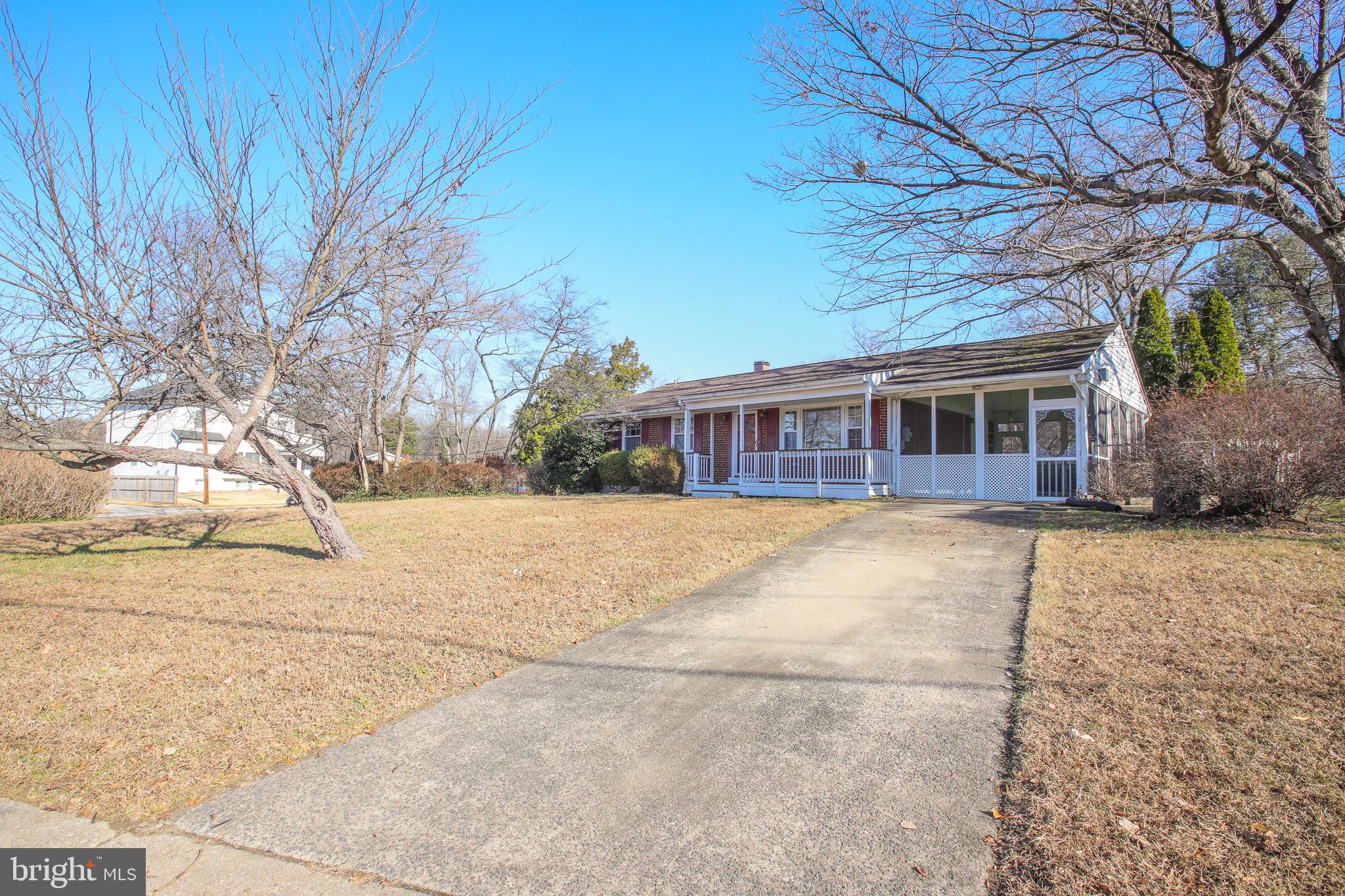 8815 Jandell Road Lorton, VA 22079 - Photo 2 of 27 a view of house with yard
