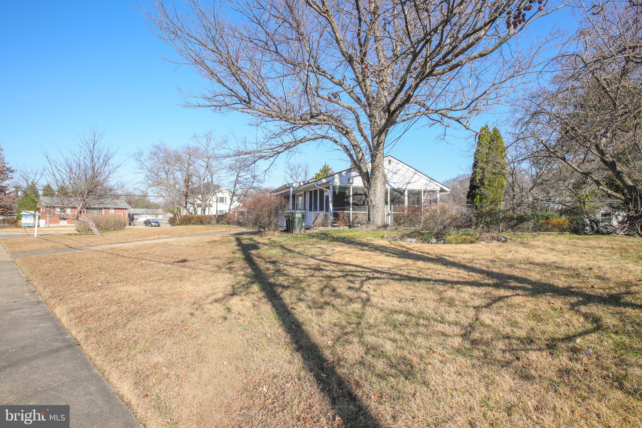8815 Jandell Road Lorton, VA 22079 - Photo 26 of 27 a view of road with large trees