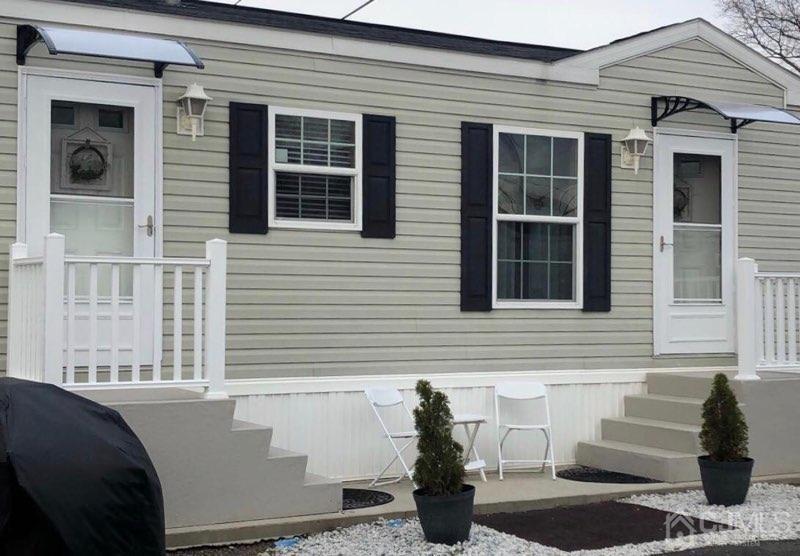 18 3rd Street Avenel, NJ 07001 - Photo 3 of 20 a view of a house and a window