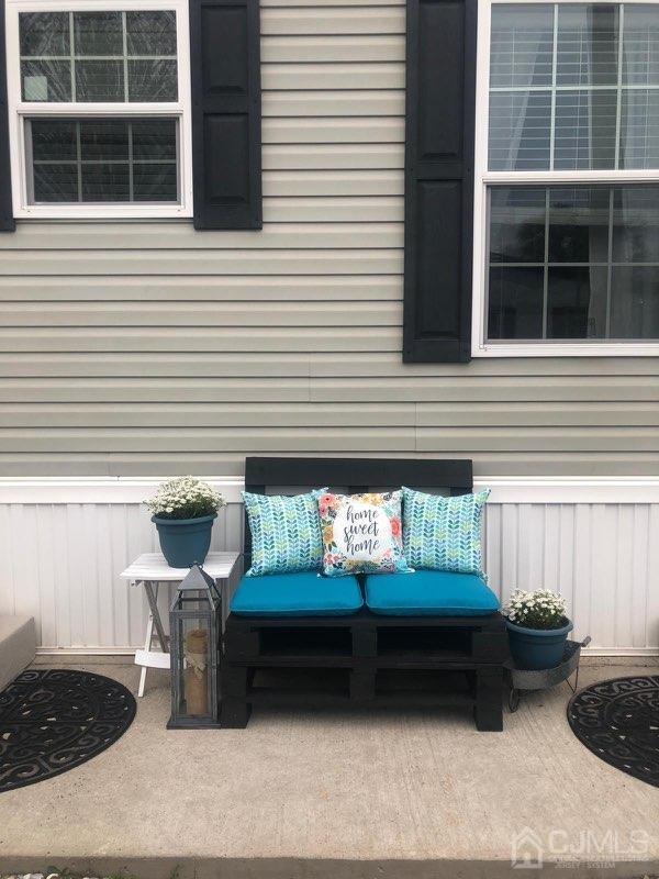 18 3rd Street Avenel, NJ 07001 - Photo 4 of 20 a view of a bench in back side of house
