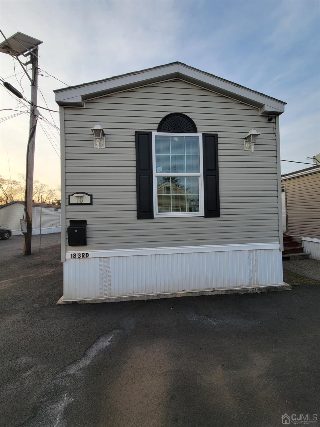 18 3rd Street Avenel, NJ 07001 - Photo 6 of 20 a view of a house with a street