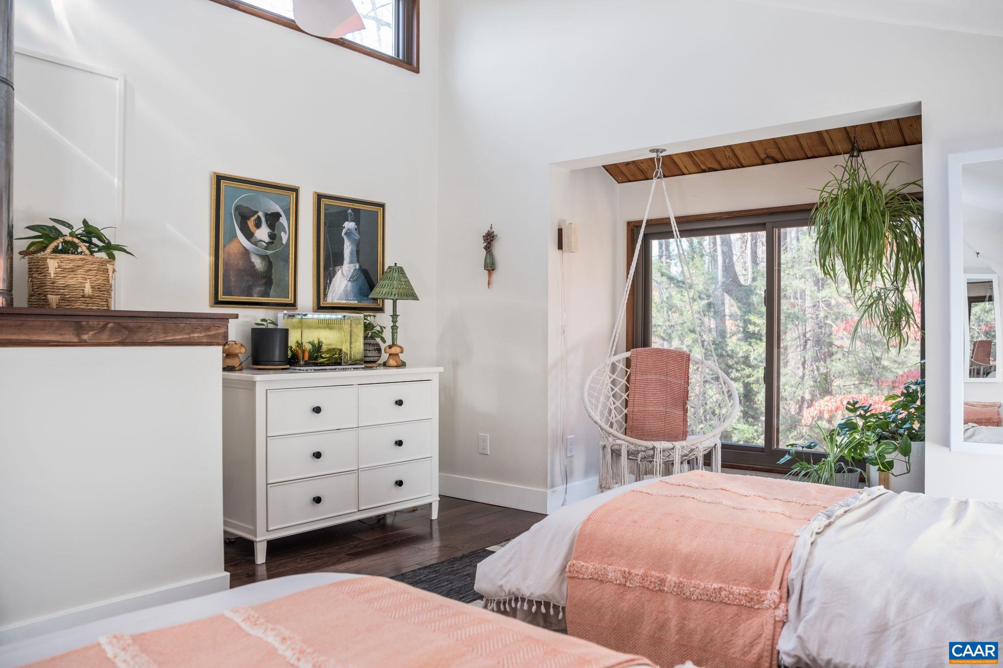 247 Blue Rock Ridge Charlottesville, VA 22903 - Photo 44 of 64 a bedroom with a bed and large windows
