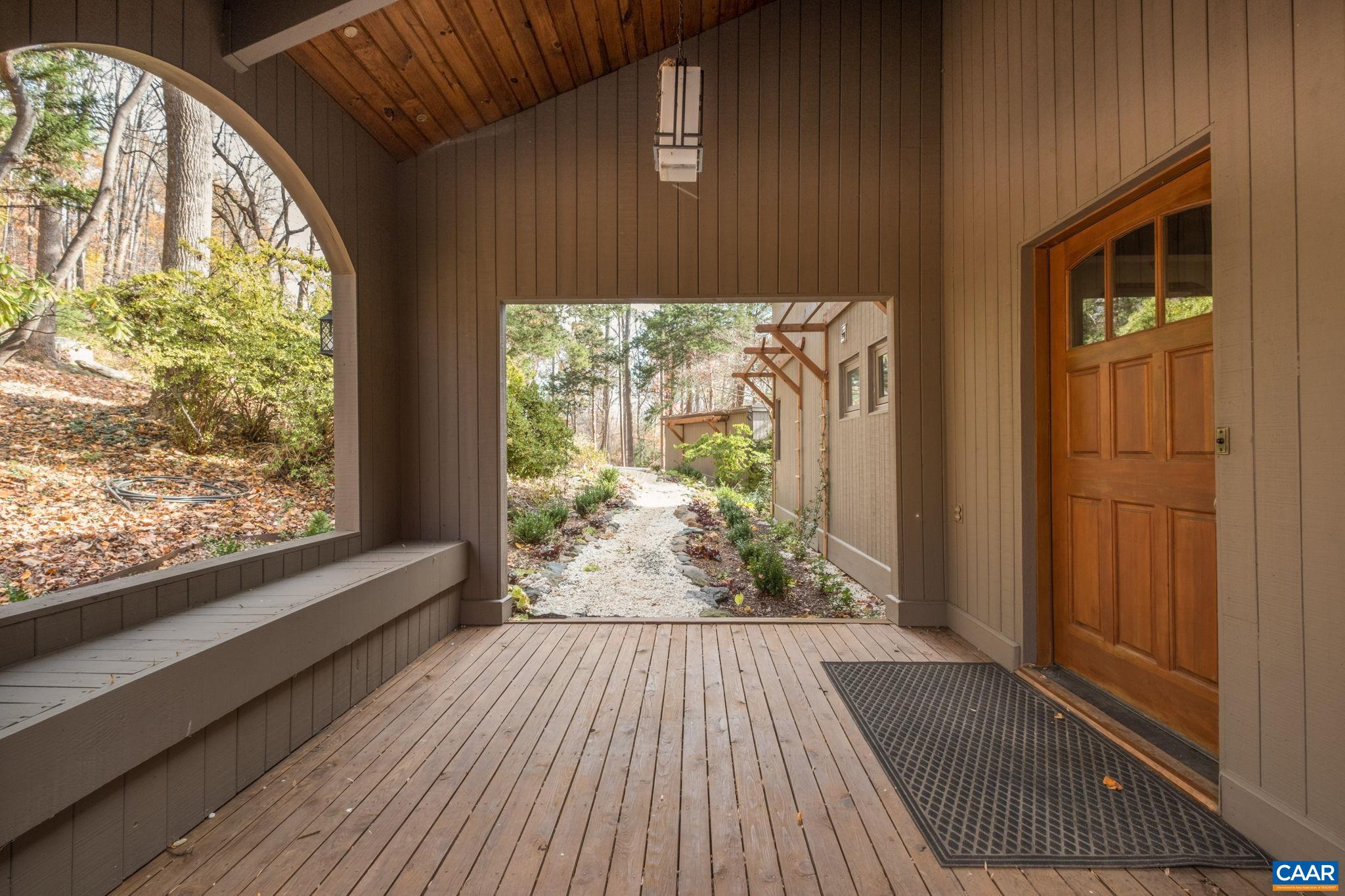 247 Blue Rock Ridge Charlottesville, VA 22903 - Photo 5 of 64 a view of a room with wooden floor and door