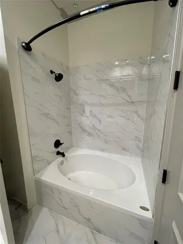 a bathroom with a bathtub