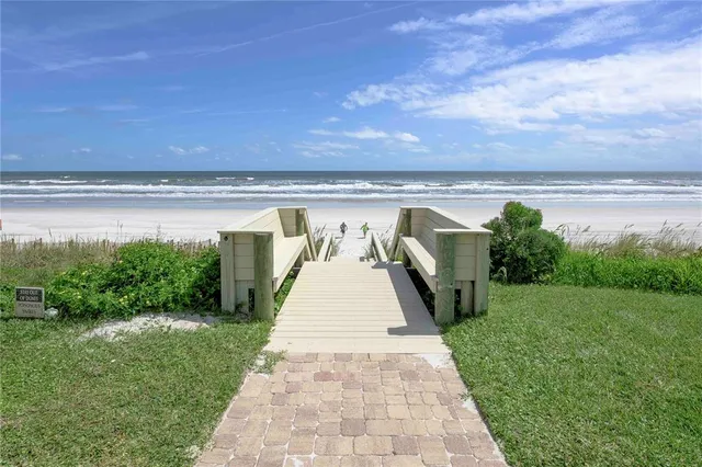 a view of a lake with a big yard