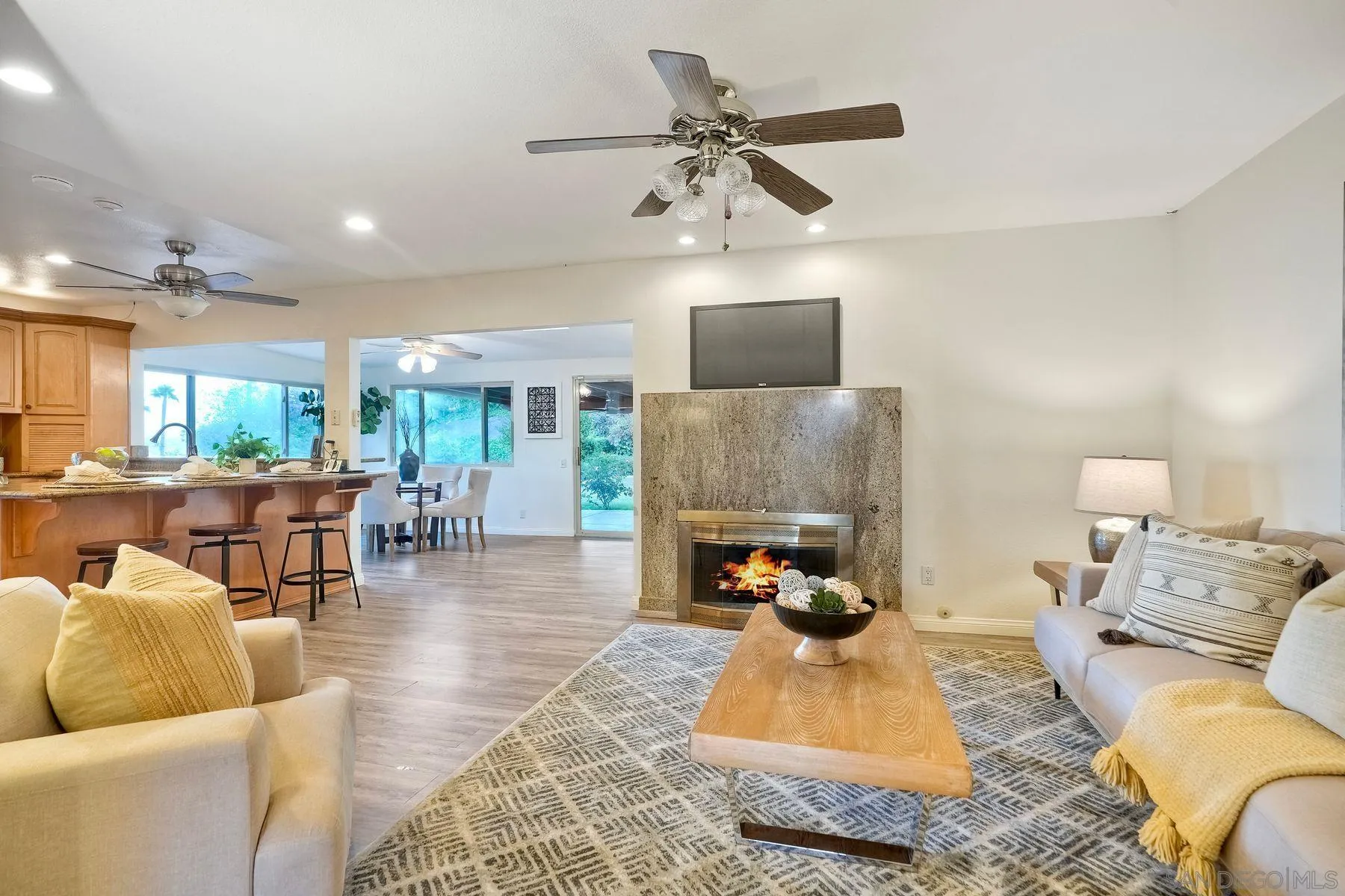 1605 Swallow Drive El Cajon, CA 92020 - Photo 15 of 39 a living room with furniture and a wooden floor