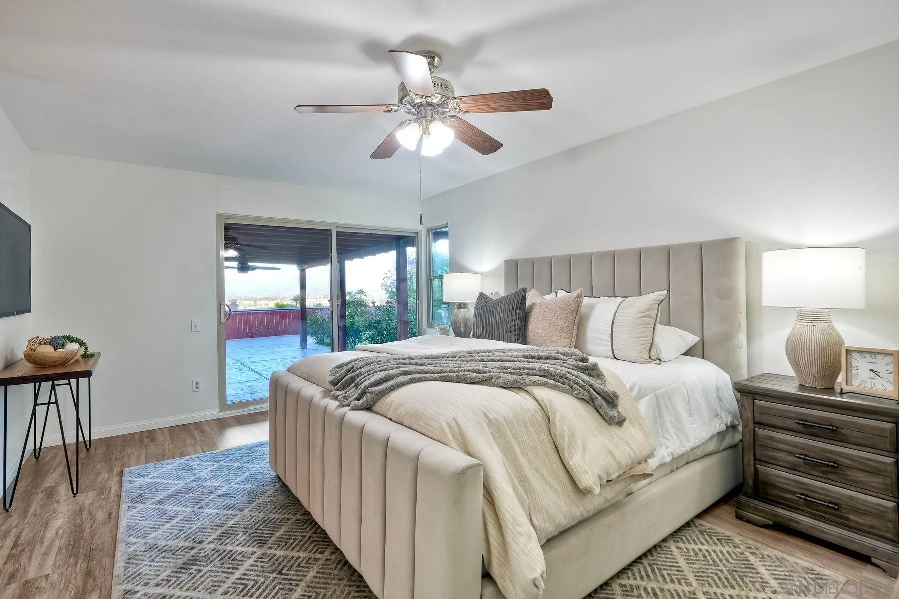 1605 Swallow Drive El Cajon, CA 92020 - Photo 19 of 39 a bed room with a bed and a chandelier