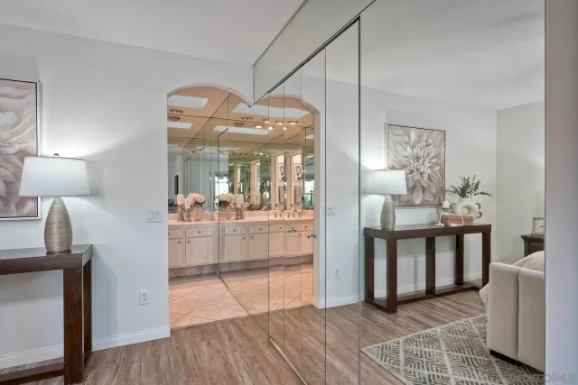 a bathroom with a shower and a sink