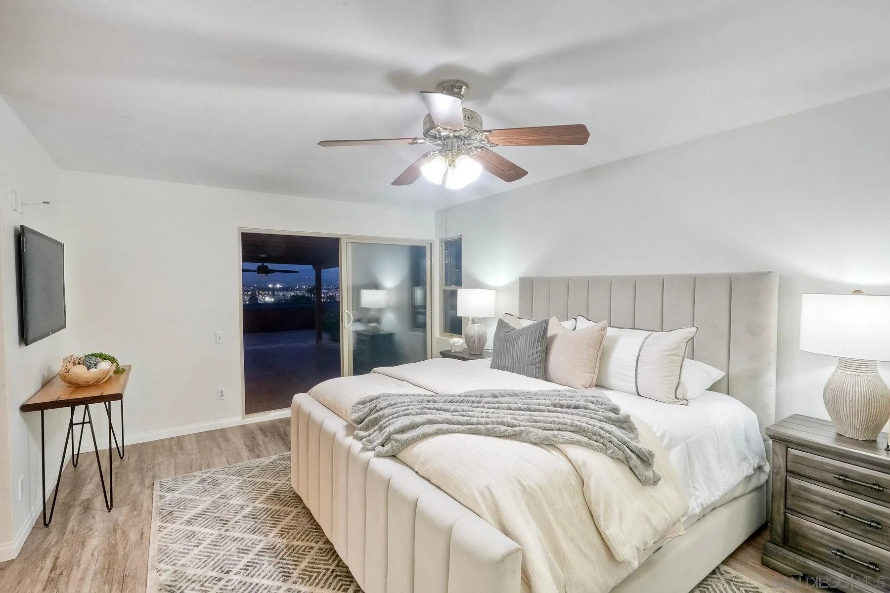 1605 Swallow Drive El Cajon, CA 92020 - Photo 32 of 39 a bedroom with a bed and a chandelier