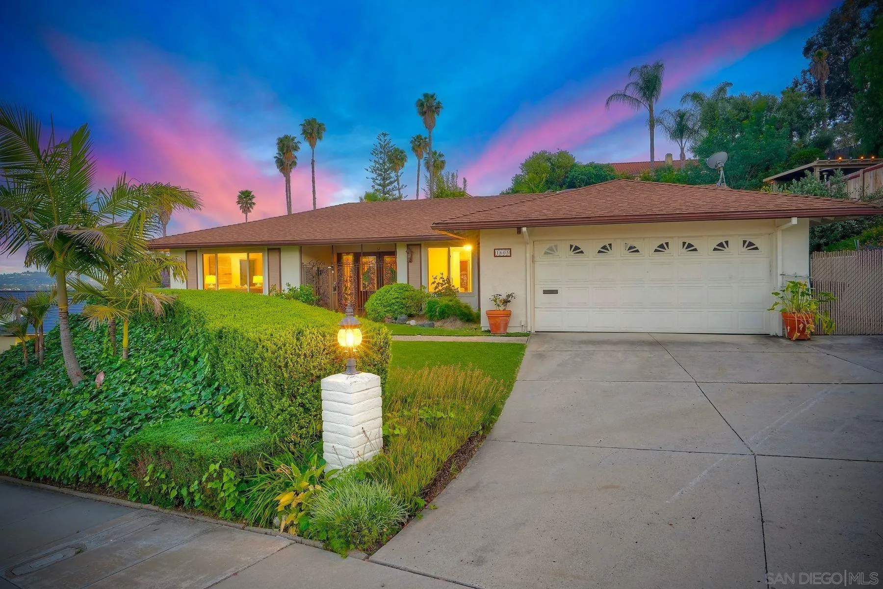 1605 Swallow Drive El Cajon, CA 92020 - Photo 34 of 39 a front view of a house with garden