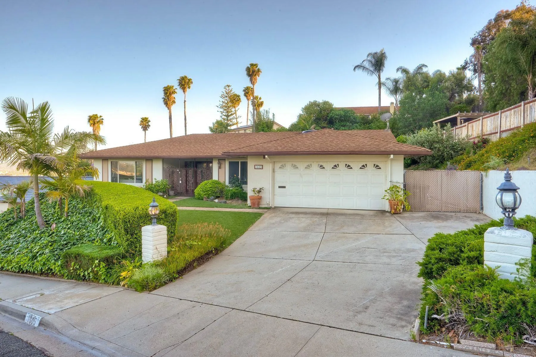 1605 Swallow Drive El Cajon, CA 92020 - Photo 35 of 39 a front view of a house with garden