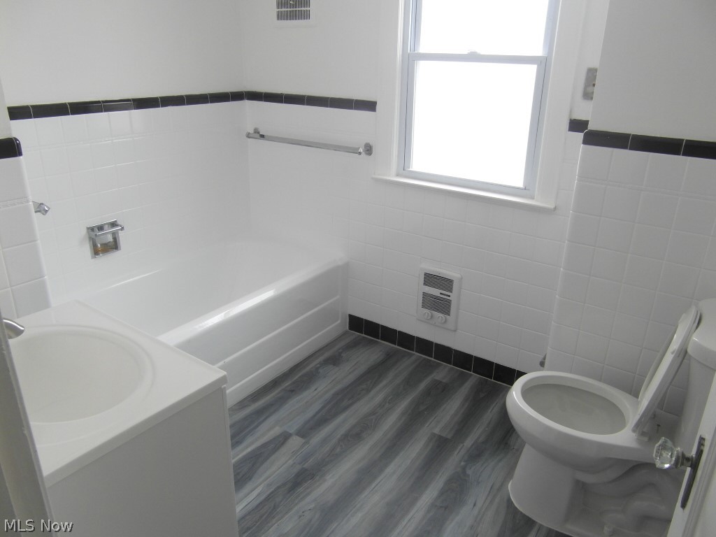 1222 Castleton Road Cleveland, OH 44121 - Photo 15 of 32 full bathroom with stand along shower #1