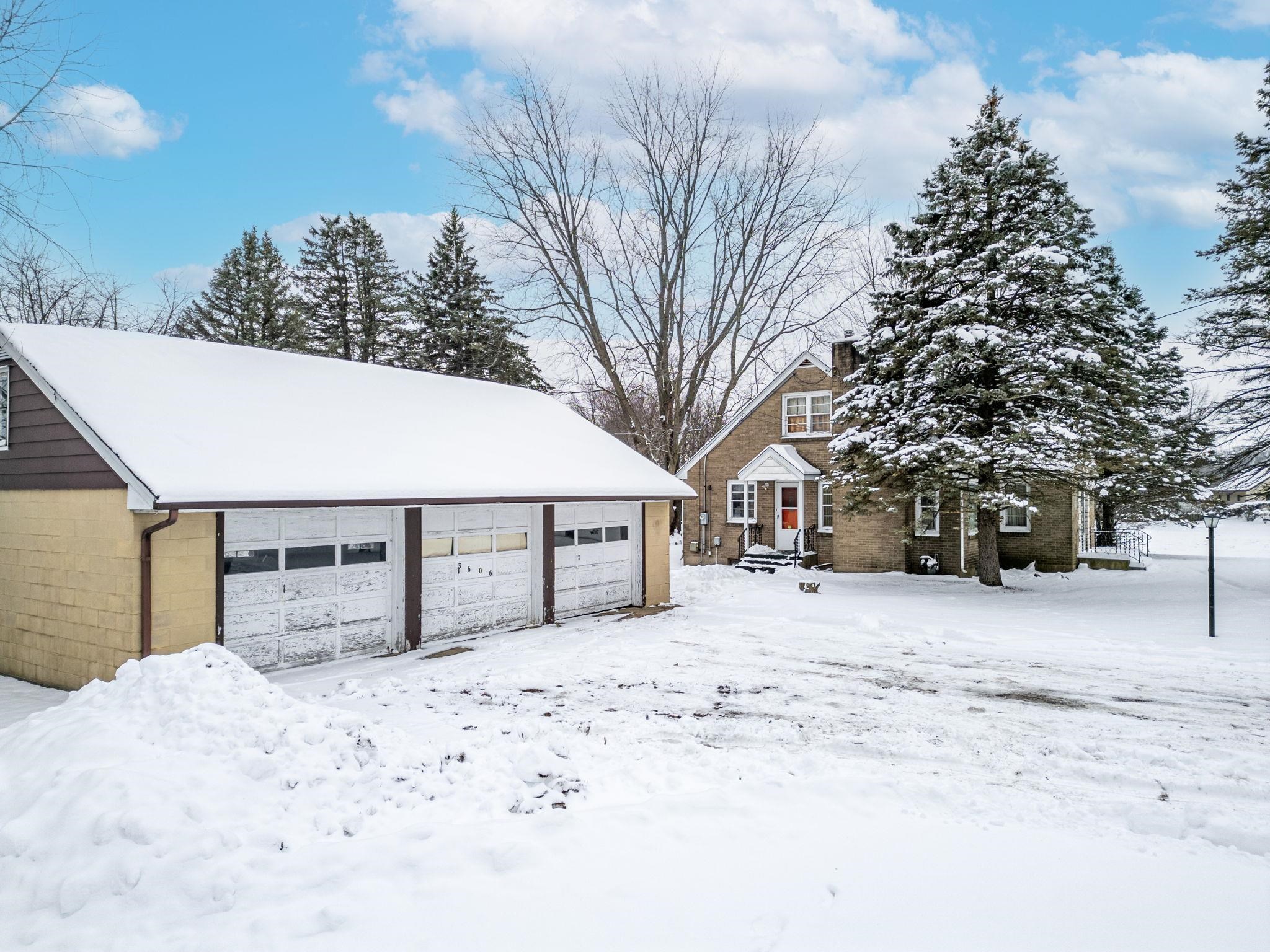 3606 Prairie Road Rockford, IL 61102 - Photo 15 of 28 a view of wooden house covered in snow