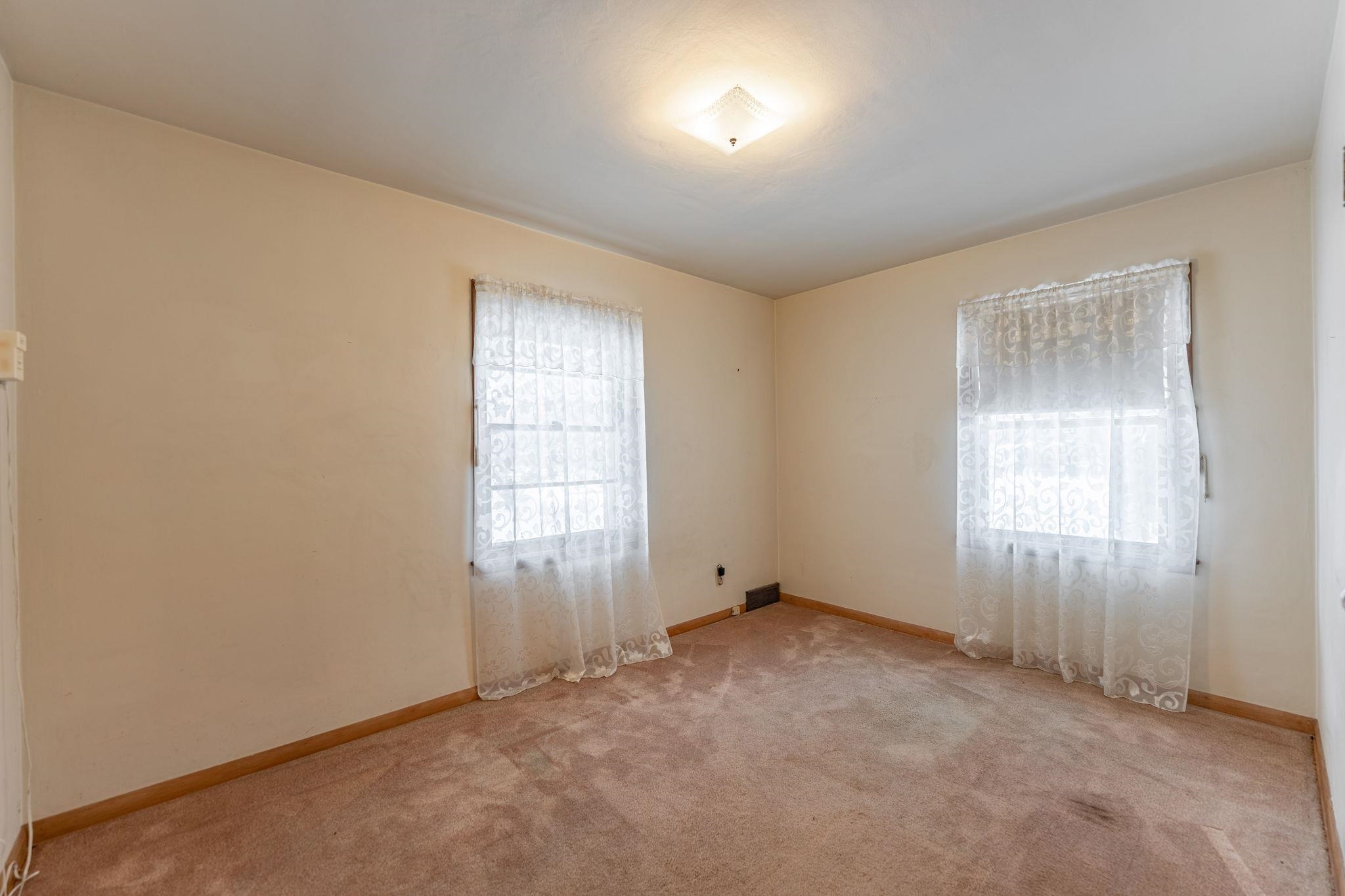 3606 Prairie Road Rockford, IL 61102 - Photo 23 of 28 an empty room with windows