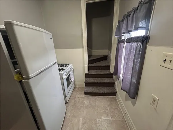 a view of an entryway with staircase