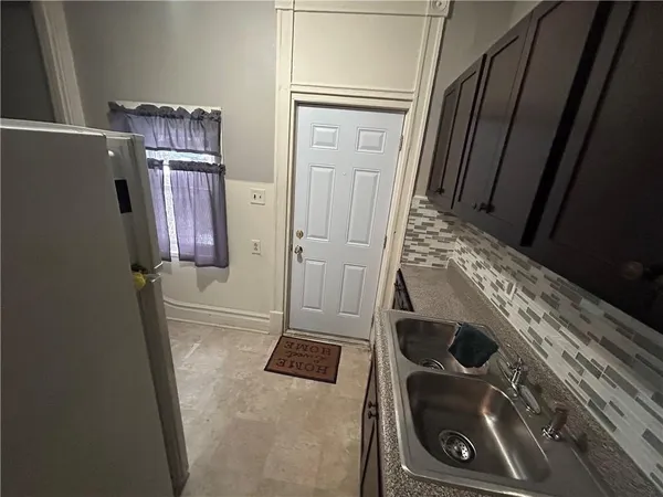 a close view of water heater washer and dryer