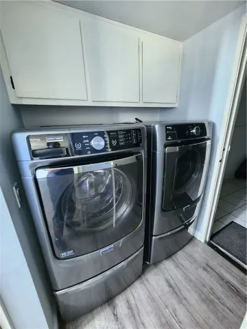 a utility room with washer and dryer