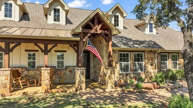 a view of multiple houses with a small yard
