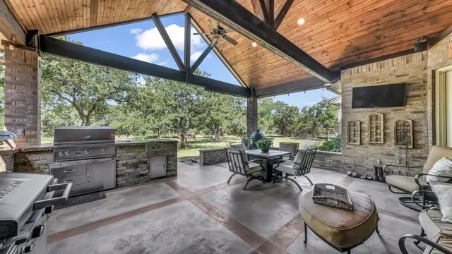 a view of a kitchen with appliances and cabinets