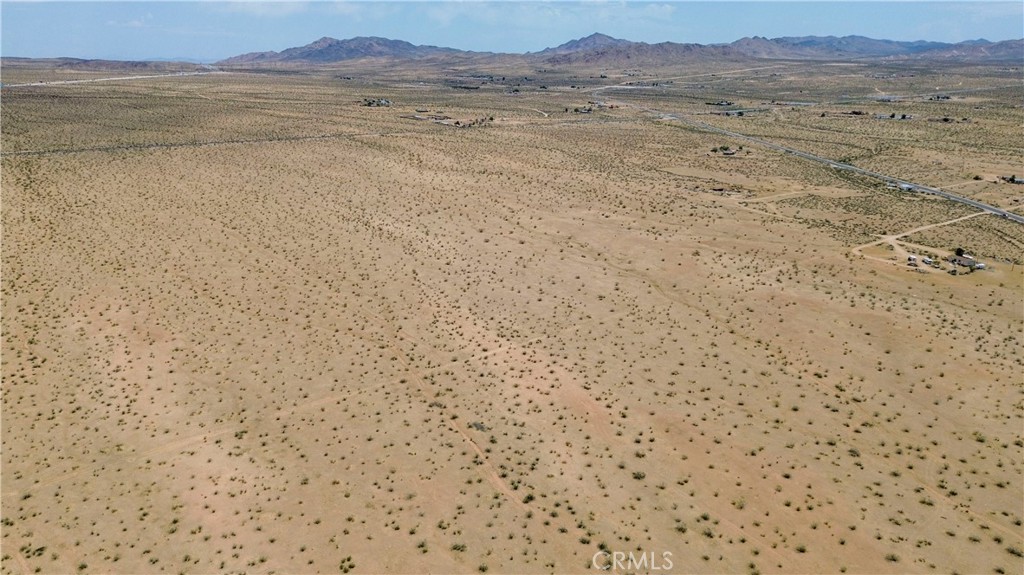 2 Cordova Road Apple Valley, CA 92307 - Photo 4 of 6 a view of an outdoor space and a mountain view
