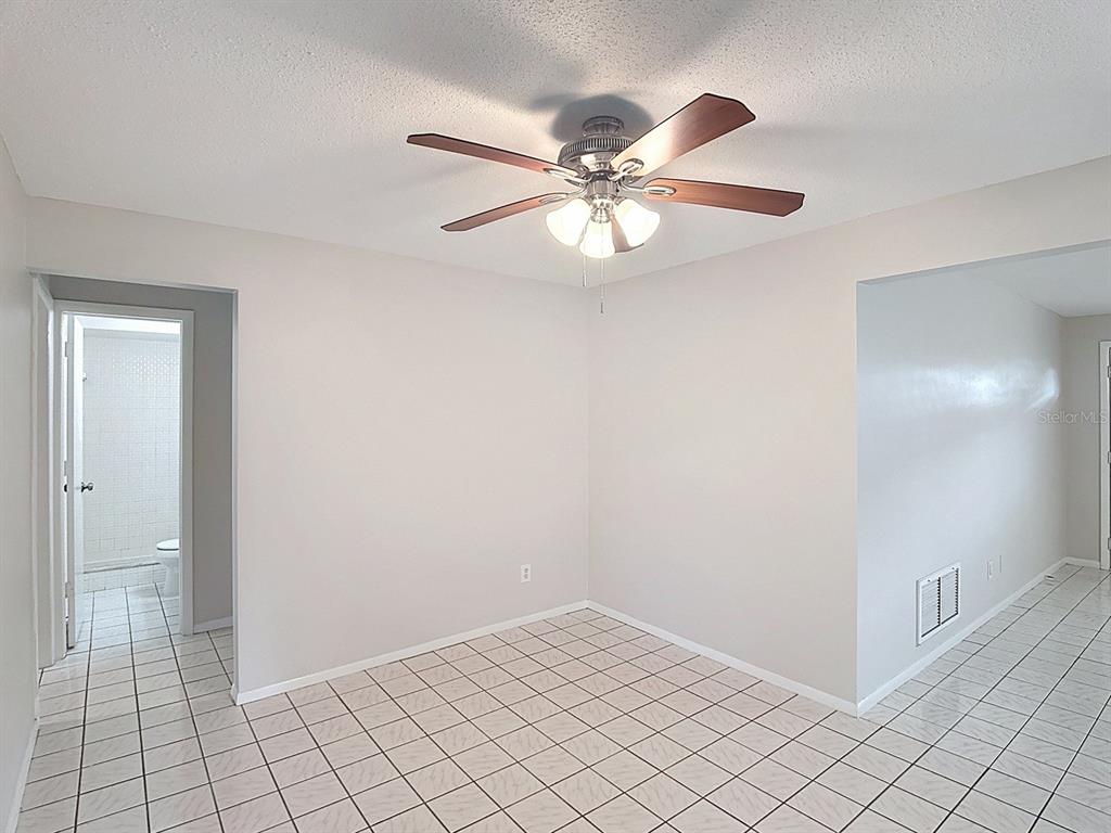 11320 Currie Lane Largo, FL 33774 - Photo 29 of 40 a view of an empty room and window