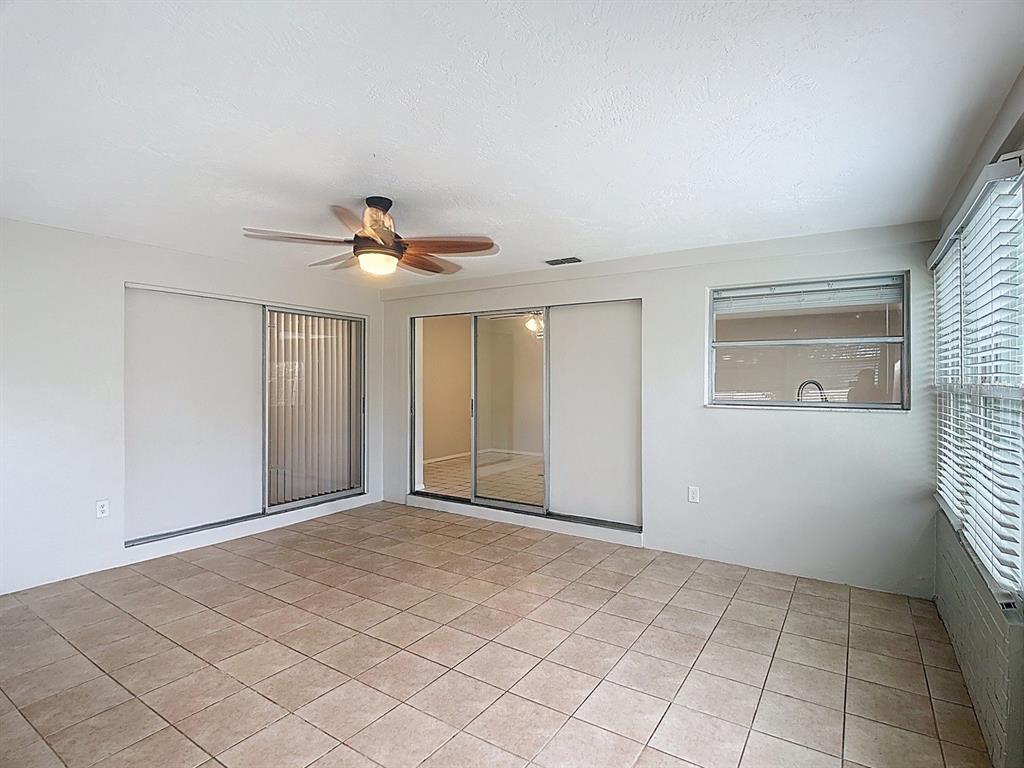 11320 Currie Lane Largo, FL 33774 - Photo 30 of 40 a view of an empty room with a window