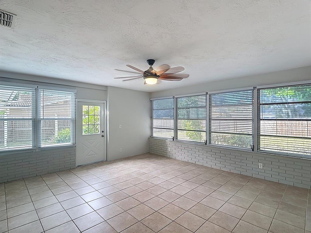 11320 Currie Lane Largo, FL 33774 - Photo 34 of 40 a view of an empty room with a window