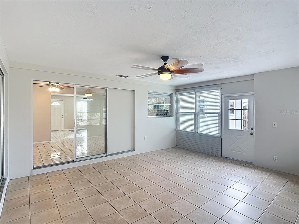11320 Currie Lane Largo, FL 33774 - Photo 10 of 40 a view of an empty room with window
