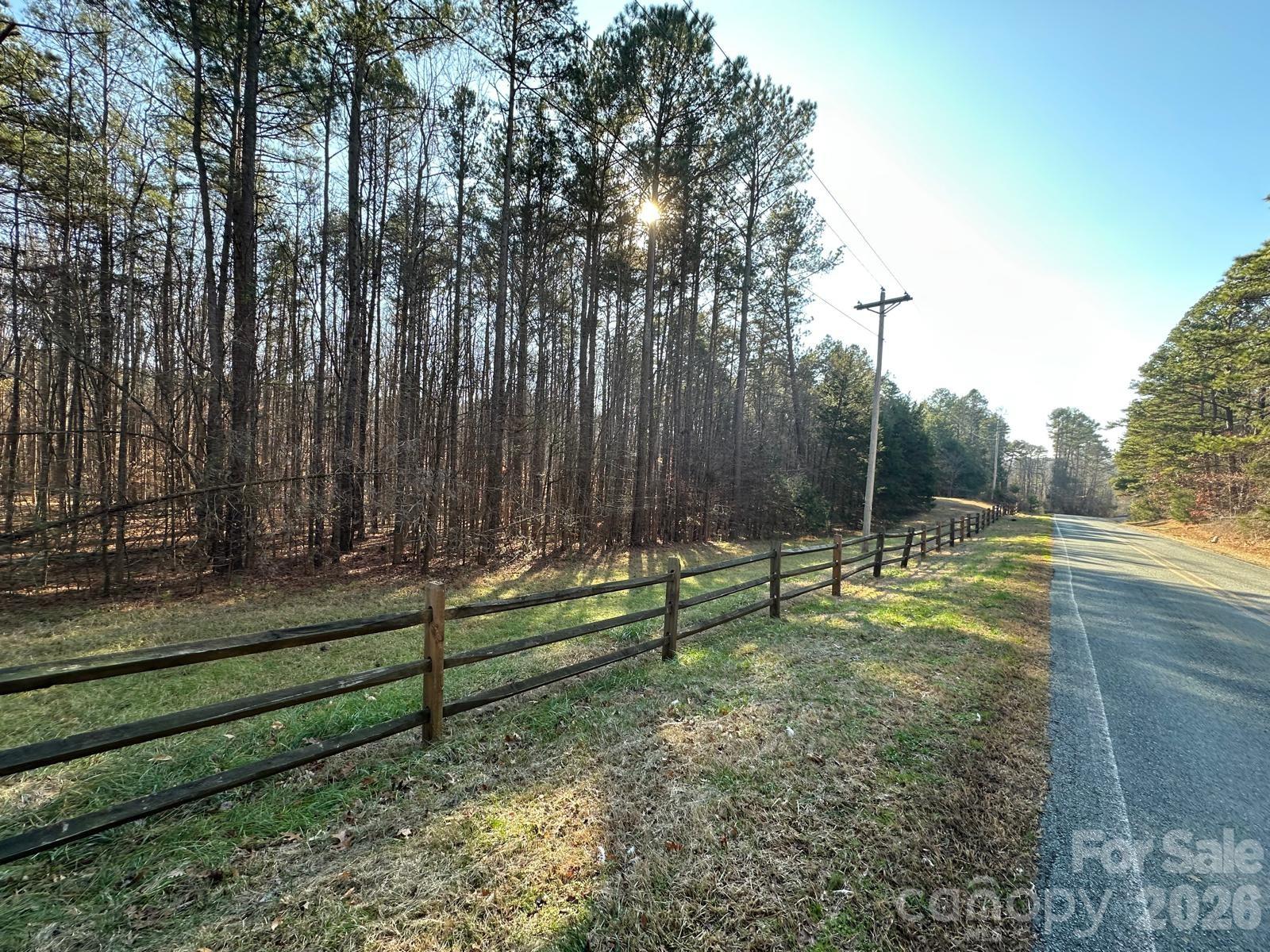 1415 Trinity Church Road Monroe, NC 28112 - Photo 6 of 10 a view of backyard with green space