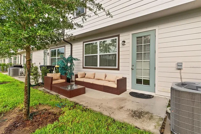 a front view of a house with patio