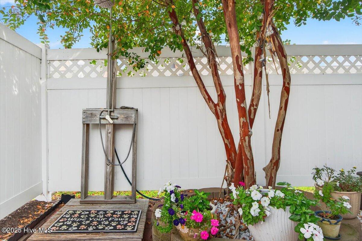7650 Front Street, Unit 3 Sunset Beach, NC 28468 - Photo 30 of 37 Outdoor Shower in Courtyard