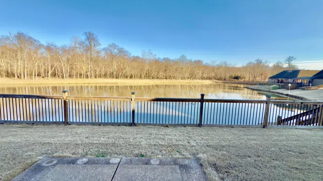 a view of a wrought iron fences in front of house