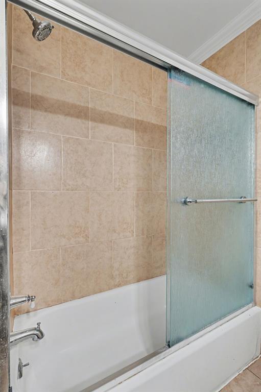 1714 East Union Bower Road Irving, TX 75061 - Photo 27 of 32 a bathroom with a bathtub and shower