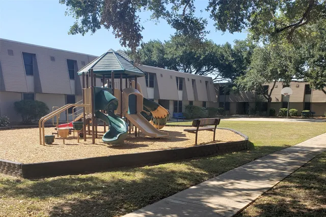 a view of a house with swimming pool