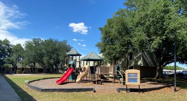 a view of a park with slide