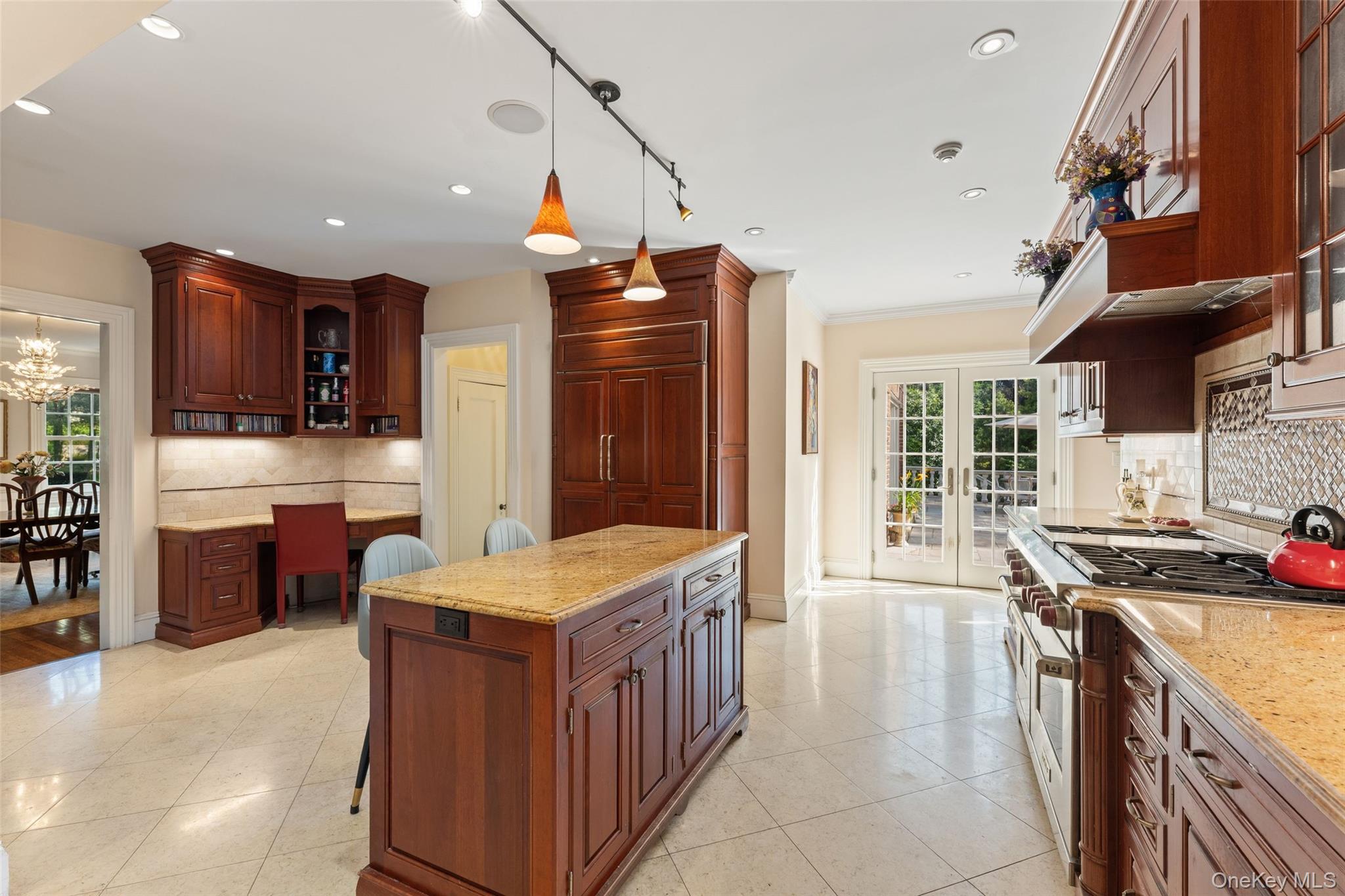 5 Cooper Road Scarsdale, NY 10583 - Photo 9 of 46 View of kitchen with french doors to patio ideal for al fresco dining