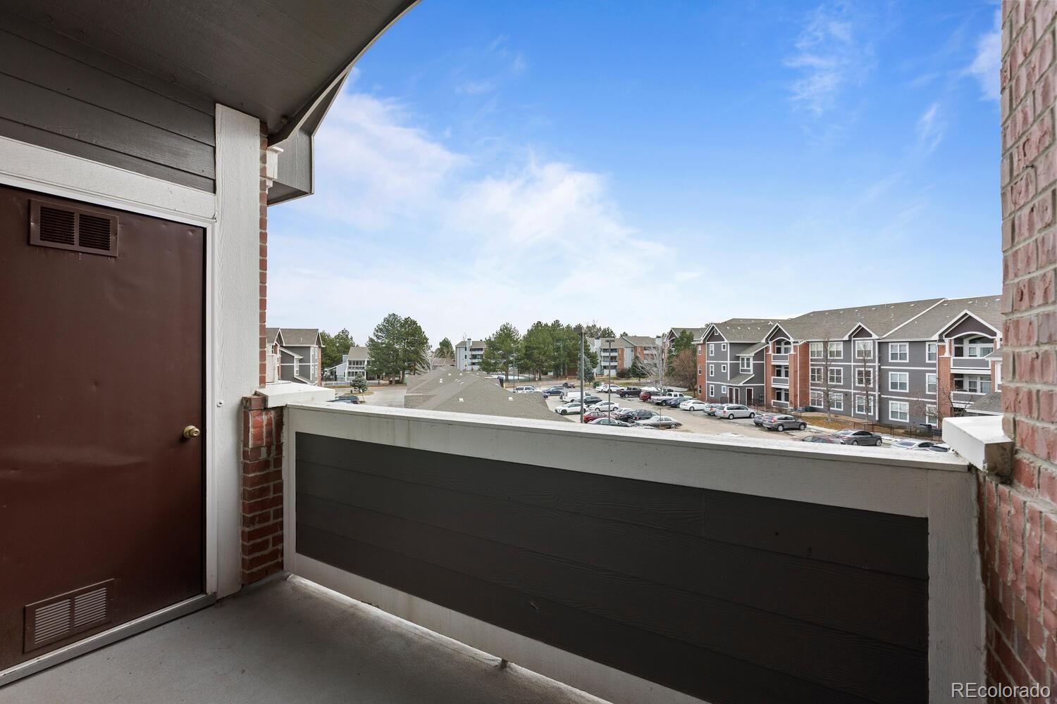 14251 East 1st Drive, Unit 305 Aurora, CO 80011 - Photo 18 of 22 a view of city from balcony